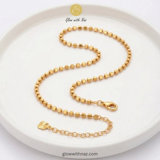 Anti-Tarnish Gold-Plated Square Bead Anklet for Women in Pakistan - Anti-Tarnish Gold-Plated Square Bead Anklet for Women in PakistanJewelryGlow With NazGlow With NazGold ball chain anklet pair with lobster clasp and extension chain in 18K gold plated stainless steel, anti-tarnish payal pair online Pakistan by Glow with Naz