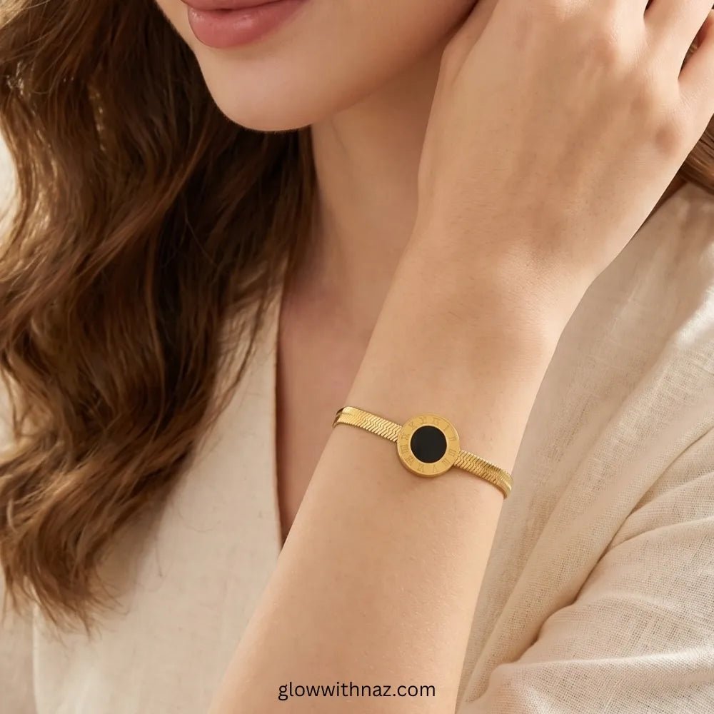 Bundle Offer: Roman Numeral Herringbone Chain Bracelet & Earrings - Bundle Offer: Roman Numeral Herringbone Chain Bracelet & EarringsJewelryGlow With NazGlow With NazClose-up of Roman numeral charm and herringbone texture