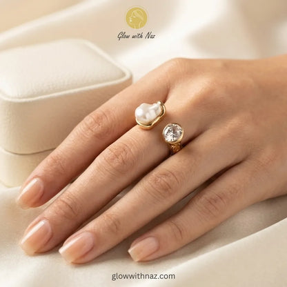 A luxury gold ring featuring a unique baroque pearl and sparkling moissanite, open-band design. ring, girls rings, rings for girls, rings simple, simple rings, stainless steel jewelry, jewellery set, aesthetic jewelry, simple jewellery, chain, jewelry, artificial jewellery, green jewellery, girls jewellery, rings for women, black ring, flower jewellery, chain for girls, jewellery for girls, jewellery