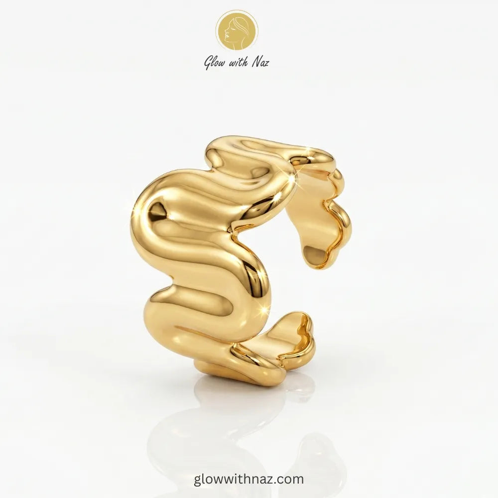 Gold molten wave sculptural adjustable free size ring in 18K gold plated stainless steel, anti-tarnish artistic statement ring available online in Pakistan by Glow with Naz, ring, girls rings, rings for girls, rings simple, simple rings, stainless steel jewelry, jewellery set, aesthetic jewelry, simple jewellery, chain, jewelry, artificial jewellery, green jewellery, girls jewellery, rings for women, black ring, flower jewellery, chain for girls, jewellery for girls, jewellery