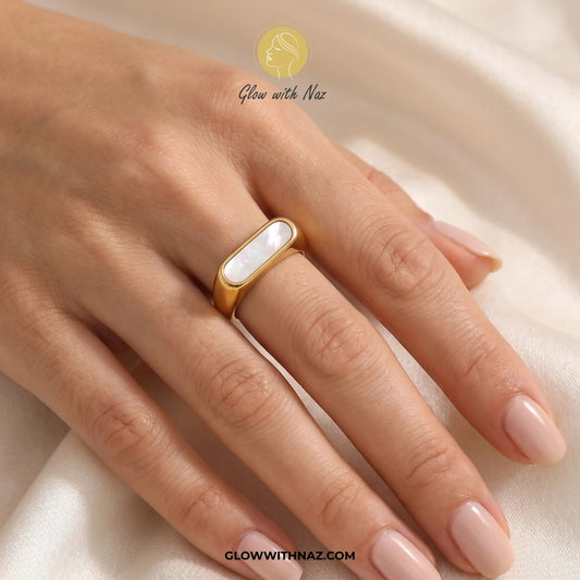 Gold ring with a white stone on a hand against a soft backgroundring gold, rings gold, gold rings, ring design, gold ring, ring, rings design, girls rings, rings for girls, gold ring price in pakistan, rings simple, simple rings, gold ring design, ring design gold, ring gold design, rings for women, black ring, rings gold design, gold rings design, aesthetic rings, ring designs, girls ring, elden ring, finger ring, rings, engagement rings gold, ring for girls, gold rings designs, gold engagement rings, beau