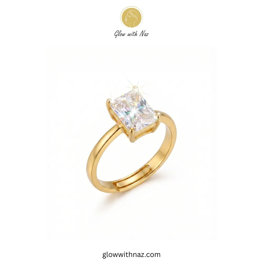 Golden radiant rectangle diamond ring sparkling on a white background ring, girls rings, rings for girls, rings simple, simple rings, stainless steel jewelry, jewellery set, aesthetic jewelry, simple jewellery, chain, jewelry, artificial jewellery