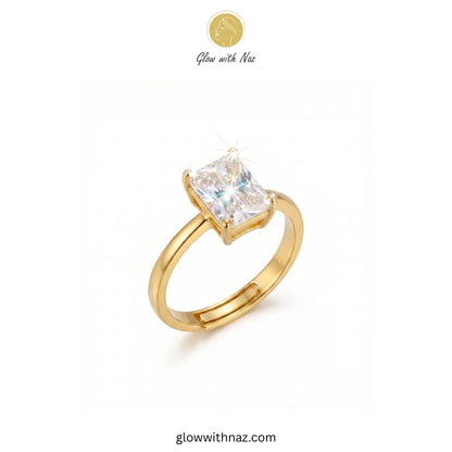 Golden radiant rectangle diamond ring sparkling on a white background ring, girls rings, rings for girls, rings simple, simple rings, stainless steel jewelry, jewellery set, aesthetic jewelry, simple jewellery, chain, jewelry, artificial jewellery