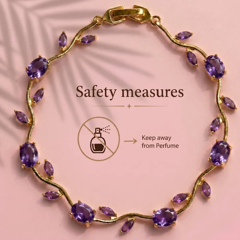 Gold leaf-shaped bracelet with oval and marquise purple amethyst gemstones, displayed on a pink background with 'Safety measures' and 'Keep away from Perfume' text and icon. Tulip Rapunzel bracelet, floral tulip bracelet, Rapunzel inspired jewelry, aesthetic tulip bracelet, trendy charm bracelet, stainless steel tulip bracelet, gold plated flower bracelet, delicate floral wrist accessory, cute aesthetic jewelry, viral tulip bracelet, Rapunzel theme accessories, dainty floral bracelet, crystal tulip charm, s