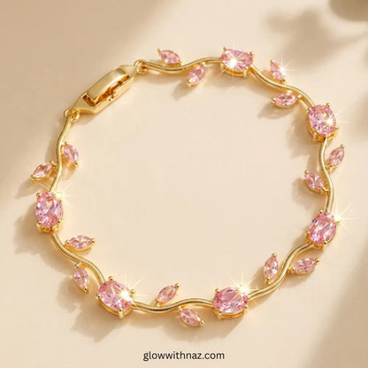 Gold bracelet with pink gemstones on a beige background Tulip Rapunzel bracelet, floral tulip bracelet, Rapunzel inspired jewelry, aesthetic tulip bracelet, trendy charm bracelet, stainless steel tulip bracelet, gold plated flower bracelet, delicate floral wrist accessory, cute aesthetic jewelry, viral tulip bracelet, Rapunzel theme accessories, dainty floral bracelet, crystal tulip charm, stacking bracelets for women, minimalist floral jewelry, spring aesthetic bracelet, elegant tulip wristband, affordable