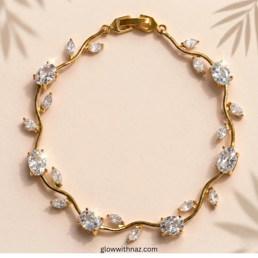 Gold bracelet with clear gemstones on a beige background Tulip Rapunzel bracelet, floral tulip bracelet, Rapunzel inspired jewelry, aesthetic tulip bracelet, trendy charm bracelet, stainless steel tulip bracelet, gold plated flower bracelet, delicate floral wrist accessory, cute aesthetic jewelry, viral tulip bracelet, Rapunzel theme accessories, dainty floral bracelet, crystal tulip charm, stacking bracelets for women, minimalist floral jewelry, spring aesthetic bracelet, elegant tulip wristband, affordabl