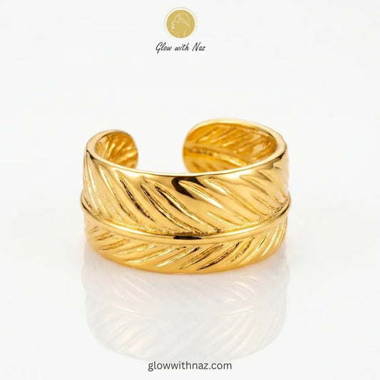 Adjustable Gold-Plated Stainless Steel Feather Wrap Wide Cuff Ring for Girls - Adjustable Gold-Plated Stainless Steel Feather Wrap Wide Cuff Ring for GirlsJewelryGlow With NazGlow With NazR0013R0013Gold feather wrap wide cuff adjustable free size ring in 18K gold plated stainless steel, nature inspired anti-tarnish ring available online in Pakistan by Glow with Naz, ring, girls rings, rings for girls, rings simple, simple rings, stainless steel jewelry, jewellery set, aesthetic jewelry, simple j