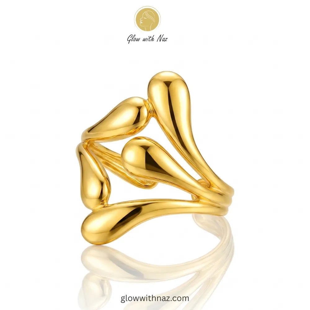 Adjustable Gold Sculptural Teardrop Statement Ring - Adjustable Gold Sculptural Teardrop Statement RingJewelryGlow With NazGlow With NazR007R007Gold sculptural teardrop statement ring in 18K gold plated stainless steel, anti-tarnish artistic ring available online in Pakistan by Glow with Naz