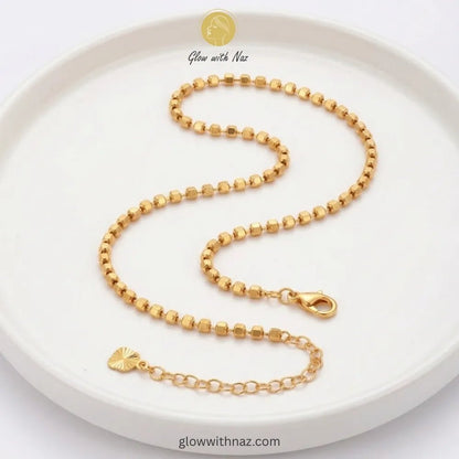 Anti-Tarnish Gold-Plated Square Bead Anklet for Women in Pakistan - Anti-Tarnish Gold-Plated Square Bead Anklet for Women in PakistanJewelryGlow With NazGlow With NazGold ball chain anklet pair with lobster clasp and extension chain in 18K gold plated stainless steel, anti-tarnish payal pair online Pakistan by Glow with Naz