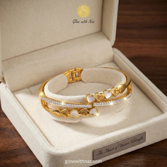 Bundle Offer: Anti-Tarnish Heart Bangle Bracelet & Stainless Steel White Ring - Bundle Offer: Anti-Tarnish Heart Bangle Bracelet & Stainless Steel White RingJewelryGlow With NazGlow With Naz6Glow With Naz viral trending gold double-band heart bangle bracelet crafted in stainless steel on a luxury cream jewelry display pad