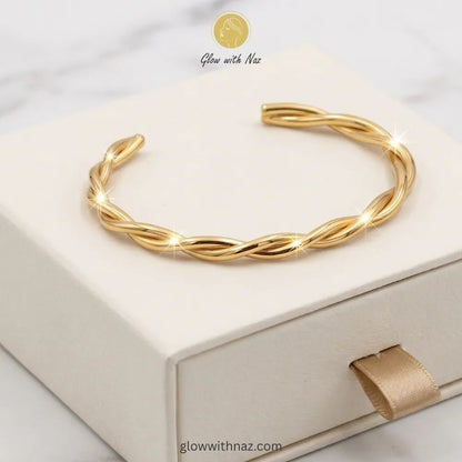 Bundle Offer: Stainless Steel Adjustable Oval Frame Ring & Twisted Gold Cuff Bracelet - Bundle Offer: Stainless Steel Adjustable Oval Frame Ring & Twisted Gold Cuff BraceletJewelryGlow With NazGlow With NazClose-up view of twisted rope texture on gold cuff