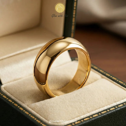 Gold-Plated Anti-Tarnish Wide Dome Band Simple Ring - Gold-Plated Anti-Tarnish Wide Dome Band Simple RingJewelryGlow With NazGlow With NazR006R0067Close-up of a chunky gold dome ring being worn as a statement piece or stacked with other rings. ring, girls rings, rings for girls, rings simple, simple rings, stainless steel jewelry, jewellery set, aesthetic jewelry, simple jewellery, chain, jewelry, artificial jewellery, green jewellery, girls jewellery, rings for women, black ring, flower jewelle