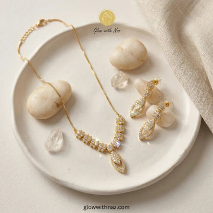 Gold Plated Radiant Blossom Zircon Necklace Jewelry Set - Gold Plated Radiant Blossom Zircon Necklace Jewelry SetJewelryGlow With NazGlow With NazN-N0019AN-N0019AGold Plated Radiant Blossom Zircon Necklace Jewelry Set necklace, pendant necklace, necklace set, locket set, simple necklace, pendant set, pendant, chain necklace, diamond pendant, diamond necklace, locket necklace, neck chain, girls locket, heart locket, pendant for girls, necklace for girls, heart necklace, locket for girls, diamond 