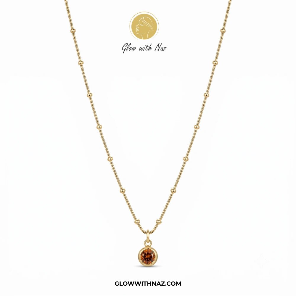 Gold Plated Stainless Steel Beaded Chain Amber Stone Pendant Necklace - Gold Plated Stainless Steel Beaded Chain Amber Stone Pendant NecklaceJewelryGlow With NazGlow With Naznecklace, pendant necklace, necklace set, locket set, simple necklace, pendant set, pendant, chain necklace, diamond pendant, diamond necklace, locket necklace, neck chain, girls locket, heart locket, pendant for girls, necklace for girls, heart necklace, locket for girls, diamond locket, pendant necklace for girls, heart ch