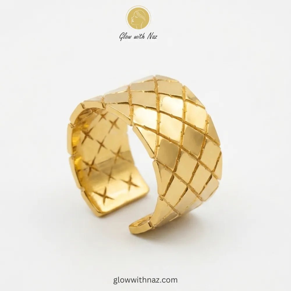 Gold Quilted Diamond Pattern Wide Cuff Adjustable Ring for Girls - Gold Quilted Diamond Pattern Wide Cuff Adjustable Ring for GirlsJewelryGlow With NazGlow With NazR011R011A wide-band gold ring featuring a textured quilted diamond pattern with an adjustable cuff design. ring, girls rings, rings for girls, rings simple, simple rings, stainless steel jewelry, jewellery set, aesthetic jewelry, simple jewellery, chain, jewelry, artificial jewellery, green jewellery, girls jewellery, rings for women,