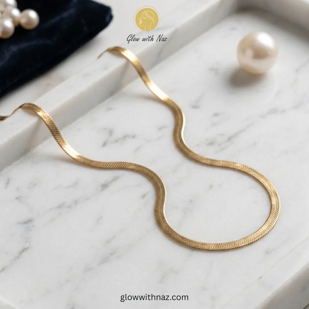 Herringbone Chain - Stainless Steel Simple Chain Necklace - Herringbone Chain - Stainless Steel Simple Chain NecklaceJewelryGlow With NazGlow With NazN0039N0039Premium gold herringbone necklace displayed on a luxury jewelry tray