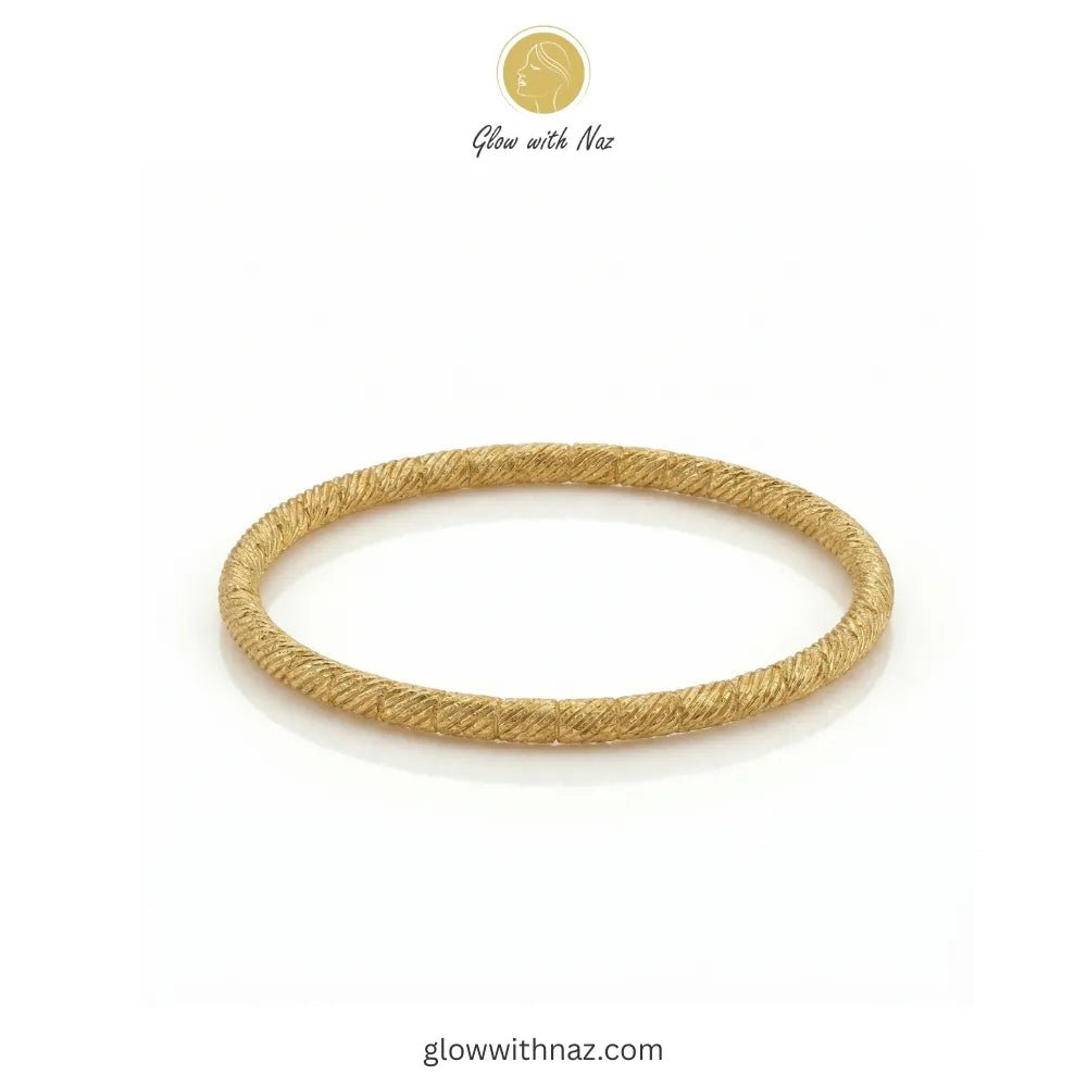 Textured Twisted Gold-Plated Stainless Steel Hand-Cuff Bangle - Textured Twisted Gold-Plated Stainless Steel Hand-Cuff BangleJewelryGlow With NazGlow With NazB0045B0045Angled view showing the craftsmanship of the twisted gold bangle