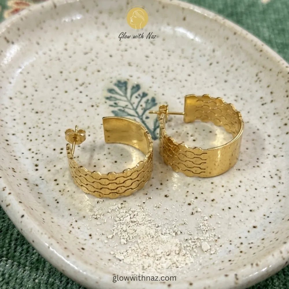 Textured Wave Stainless Steel Hoop Earrings for Girls - Textured Wave Stainless Steel Hoop Earrings for GirlsJewelryGlow With NazGlow With NazE021E021Gold textured hoop earrings displayed to showcase their minimalist shape