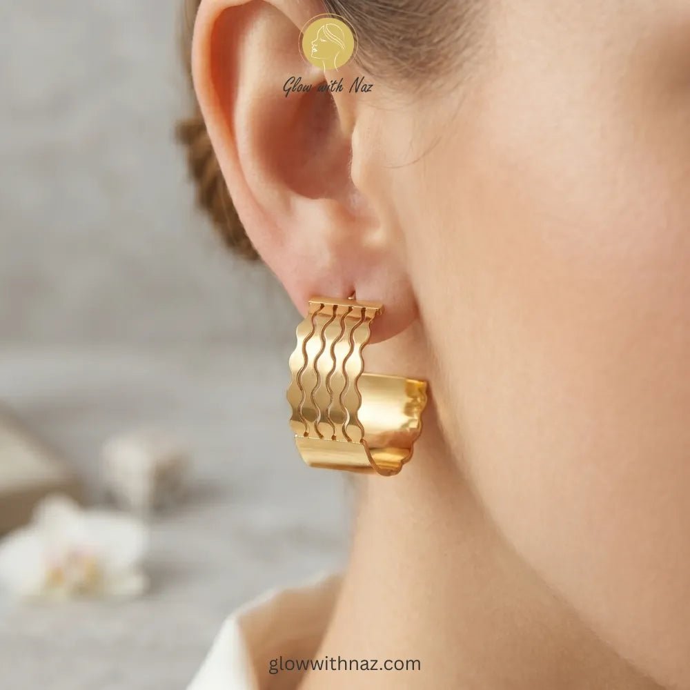 Textured Wave Stainless Steel Hoop Earrings for Girls - Textured Wave Stainless Steel Hoop Earrings for GirlsJewelryGlow With NazGlow With NazE021E021Close-up detail showing the intricate layered wave pattern and gold finish